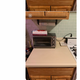 Illustration for article titled I Faked Nice Countertops With These Marble Stickers